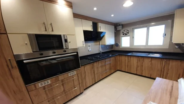 Cream and black kitchen interior